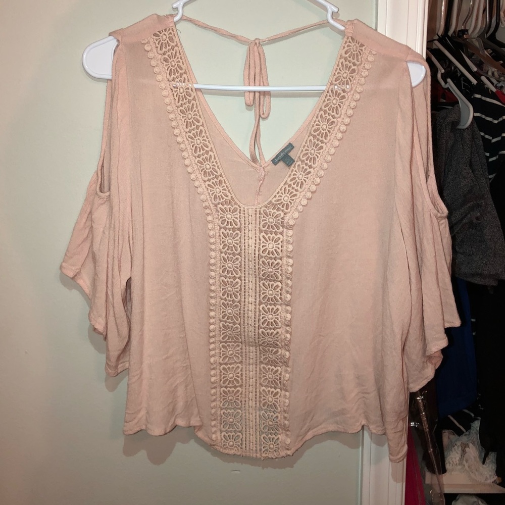 Flowy light pink shirt with crocheted detailing